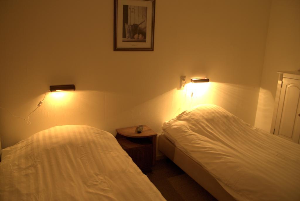 Hotel "De Steenen Man" Zurich Szoba fotó